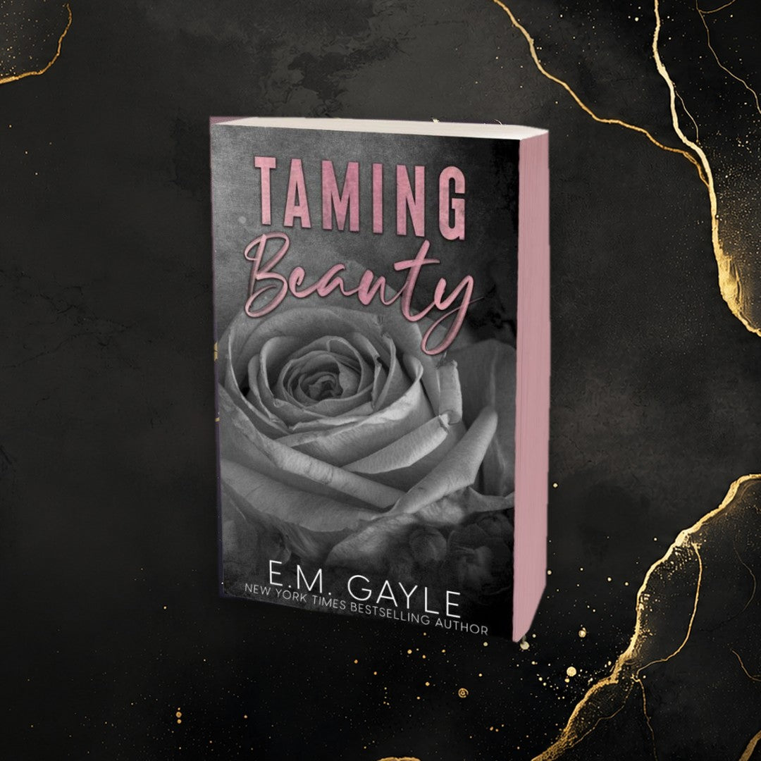 Shop exclusives - Taming Beauty special edition with pink sprayed edges on black and gold marble